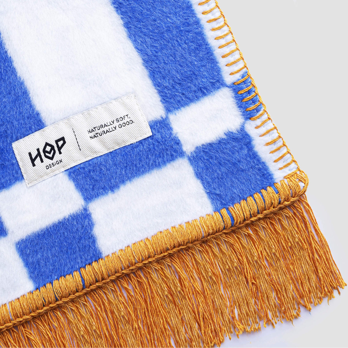 Koc bawełniany SOFT krata niebiesko-biała – Hop Design, detal